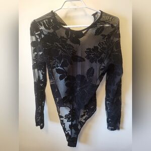 beautiful bodysuit no size but can fit medium barely worn
